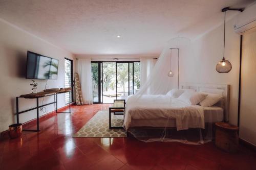 Postel nebo postele na pokoji v ubytování Hotel Boutique KAA