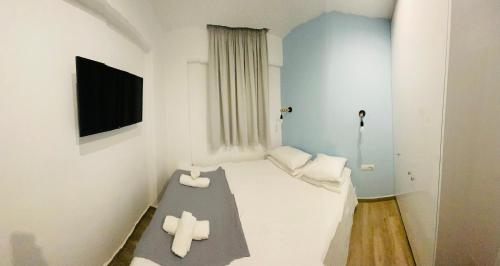 Postel nebo postele na pokoji v ubytování Block66