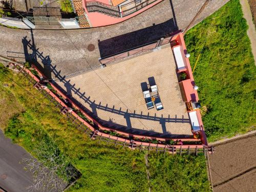 an overhead view of a building with a train at Du.Val - Madeira Valley Villa in Ribeira Brava