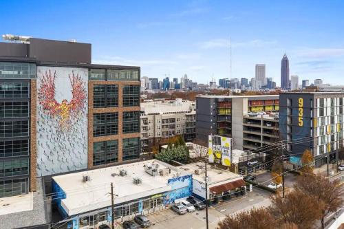 a city with a mural on the side of a building at GROVE PARK- ‘Newly Renovated’ home- just mins from Midtown/Downtown Atlanta. in Atlanta