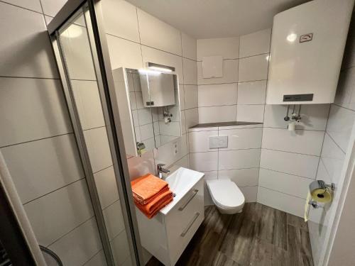 Ένα μπάνιο στο Apartment Bodensdorf near Ski & Lake