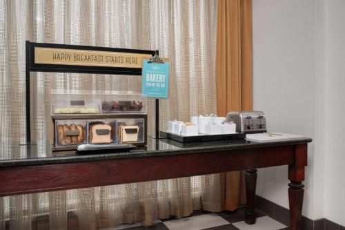 a counter in a hotel room with a bakery at Hampton Inn Easton in Easton