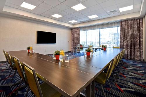 a large conference room with a large table and chairs at Hampton Inn & Suites Las Vegas Convention Center - No Resort Fee in Las Vegas