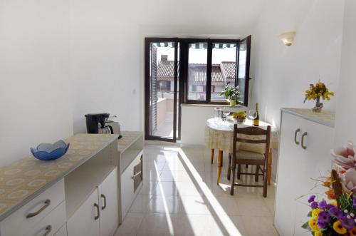 Apartments with parking space Umag - 22659