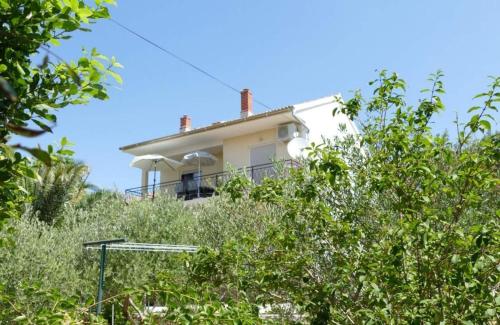 Apartments with parking spaces Barbat, Rab - 22660