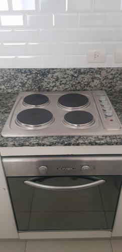 Η κουζίνα ή μικρή κουζίνα στο Tigre Studio Apartment