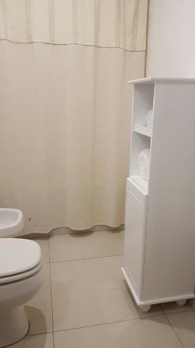 Ένα μπάνιο στο Tigre Studio Apartment
