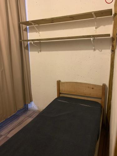 Ένα ή περισσότερα κρεβάτια σε δωμάτιο στο Casa de aluguel praia do rosa