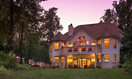 a large house with a wrap around porch at Cherry Valley Manor in Stroudsburg