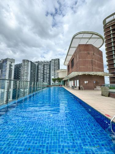 a large swimming pool on the roof of a building at KidsVille Slide LoftPlay Safari, Afiniti I 5mins Walk to Legoland JB, Johor Bahru, Malaysia in Nusajaya