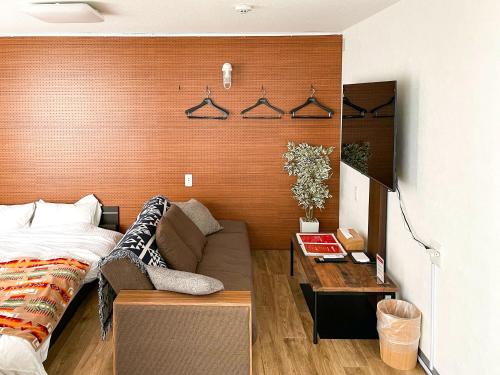 Postel nebo postele na pokoji v ubytování Rakuten STAY VILLA Miyakojima Maehama Beach