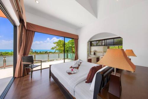 Ένα ή περισσότερα κρεβάτια σε δωμάτιο στο Sunny Banks 4 Bedroom Pool Villa