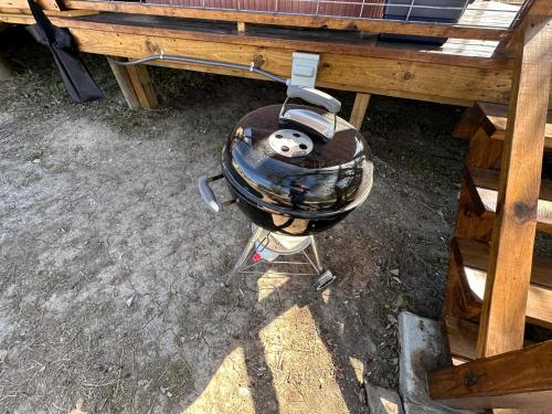 a panda helmet sitting on top of a table at Bandera Stronghold - Cochise Tipi in Bandera