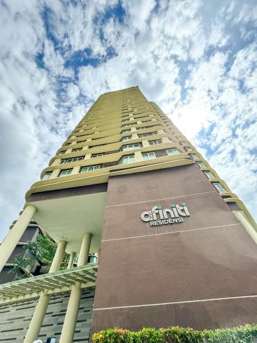 a tall building with a sign on the side of it at KidsVille Slide LoftPlay Safari, Afiniti I 5mins Walk to Legoland JB, Johor Bahru, Malaysia in Nusajaya