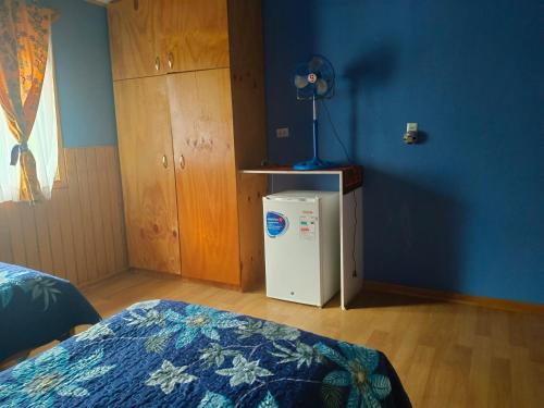Postel nebo postele na pokoji v ubytování Hostal Kaiheke