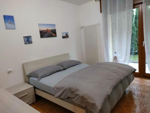 Ένα ή περισσότερα κρεβάτια σε δωμάτιο στο Sunflower Apartment