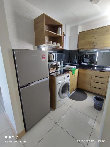 Kuchyň nebo kuchyňský kout v ubytování MrK Penthouse at Timurbay