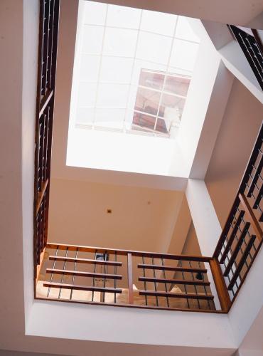 a spiral staircase with a skylight in a building at Sandy Bliss Villa in Sri Jayewardenepura Kotte