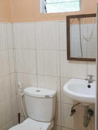 Un baño de James Homestay