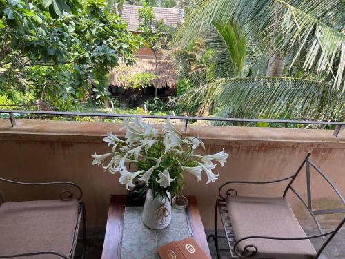 Un balcón o terraza en An Villa boutique resort