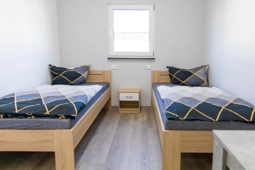 Ένα ή περισσότερα κρεβάτια σε δωμάτιο στο La Maria Aparts