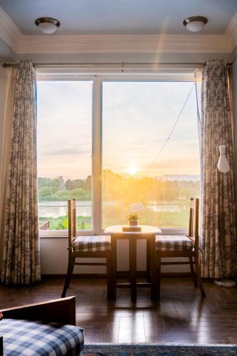 Fotografie z fotogalerie ubytování Brigadier Farm Stay Sunset Room v destinaci Khatīma