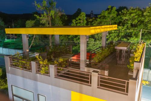 a view of the deck of a cruise ship at night at The Bua Boutique Resort in Ban Huai Krabok