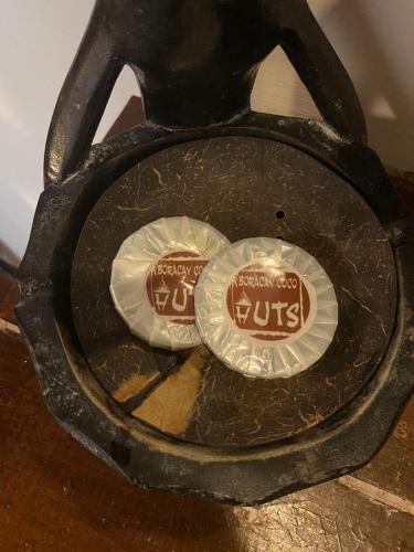 two paper plates sitting on top of a stove at Boracay Coco Huts in Boracay