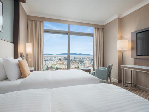 Cama o camas de una habitación en Selectum City Ataşehir