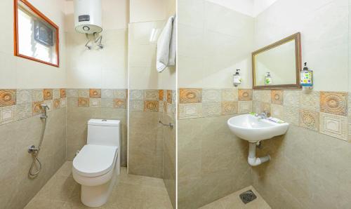 a bathroom with a toilet and a sink at Itsy Hotels Elite Inn in Chennai