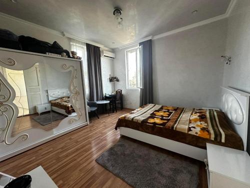 Postel nebo postele na pokoji v ubytování Guest House Maia