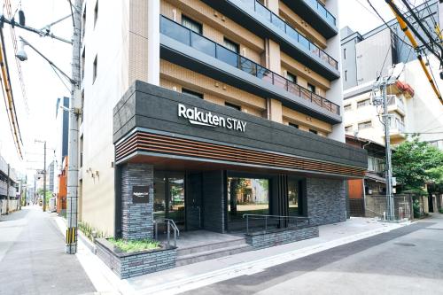 a building with a sign that reads roelandstein stay at Rakuten STAY Kokura Station in Kitakyushu
