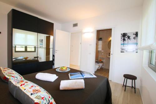 Posezení v ubytování Ikhaya Como - Acquaseria, San Siro by LoveComo