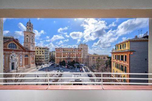 a view of a city from a window at LUXURY BASILICA & SEA VIEW 35 - GENOVAINRELAX in Genova