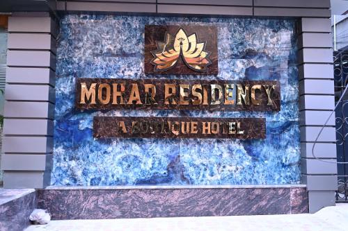 Certificado, premio, señal o documento que está expuesto en Mohar Residency