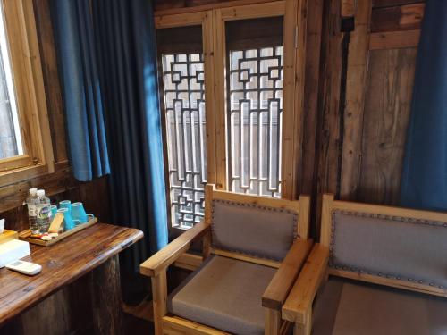 Χώρος καθιστικού στο Lost World Sanjiang Guest house