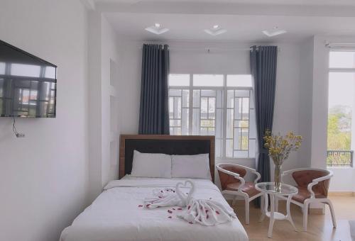 Postel nebo postele na pokoji v ubytování Phuong Vy Hotel