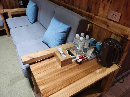 Χώρος καθιστικού στο Lost World Sanjiang Guest house