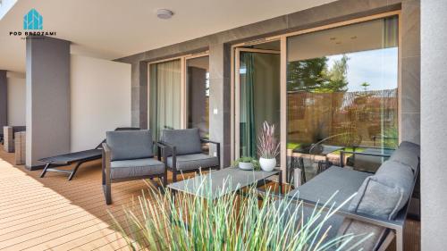 Posezení v ubytování Pod Brzozami Apartamenty Gea Eco