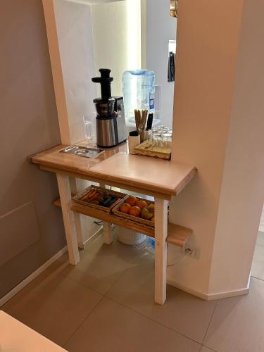 Borgoleoni 18 - Room and Breakfastにあるキッチンまたは簡易キッチン