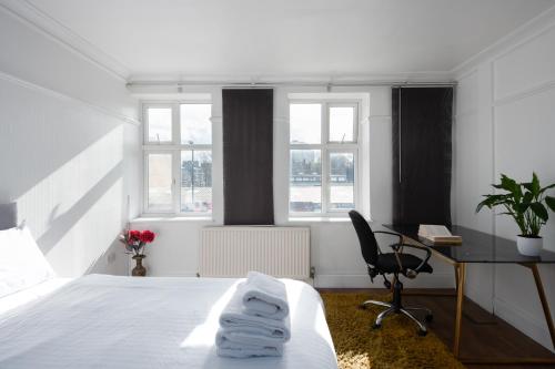 Katil atau katil-katil dalam bilik di Argyle Apart Hotel