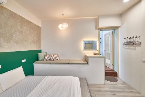 Ein Bett oder Betten in einem Zimmer der Unterkunft Light of the Dawn