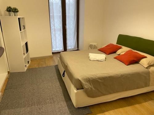 Una cama o camas en una habitación de L'Atelier Dei Quattro Canti