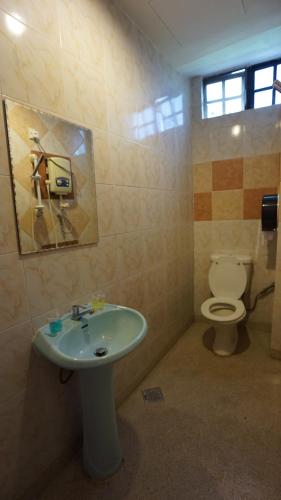 Koupelna v ubytování Zen Zeng Hotel