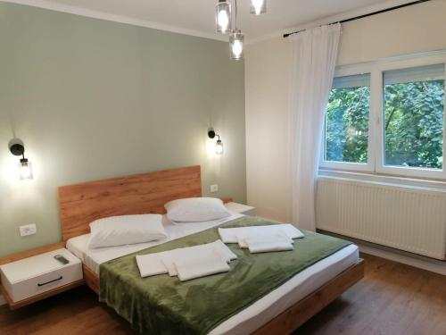 Postel nebo postele na pokoji v ubytování Apartament Alena Oradea