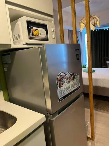 Dapur atau dapur kecil di Serenity Haven by J&M at Azure North Pampanga