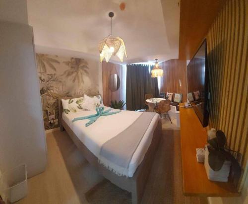Katil atau katil-katil dalam bilik di Serenity Haven by J&M at Azure North Pampanga