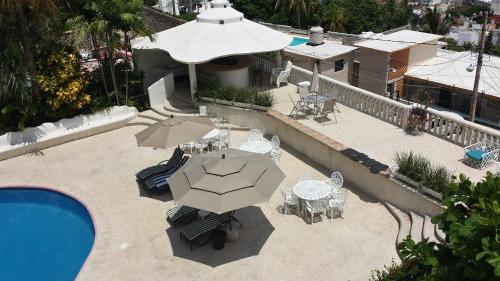 Vista de la piscina de Villa Condesa o cercanías