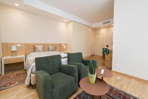 Postel nebo postele na pokoji v ubytování GoodStay Cianci Luxury Room
