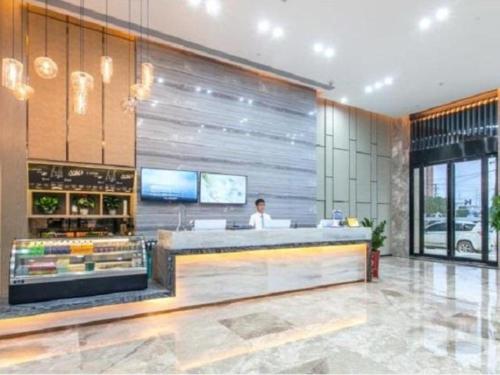 City Comfort Inn Wuhan Tianhe Airport Outlets tesisinde lobi veya resepsiyon alanı
